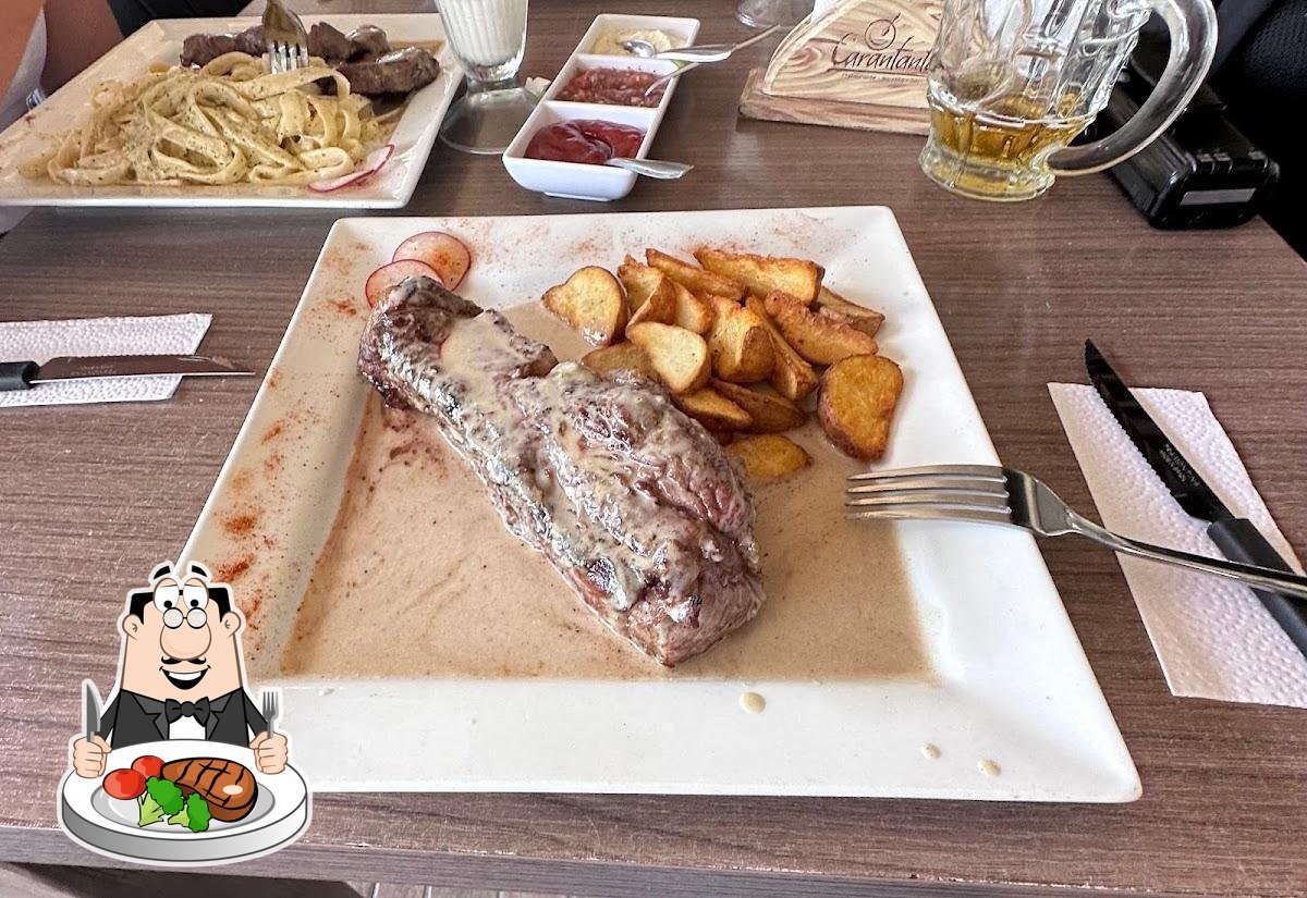 Chuleta de cerdo en salsa de champiñones con papas doradas